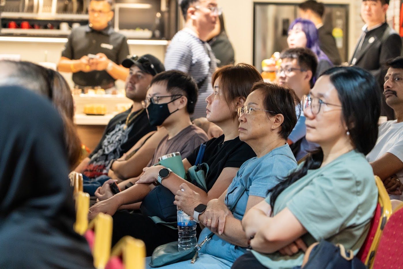 Audience listening at the renovation talk