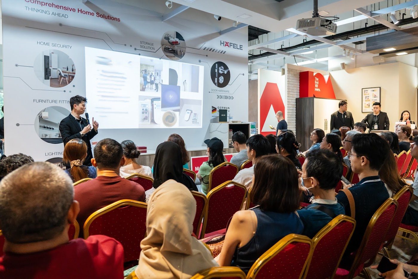 Packed seating area during a talk at the carnival